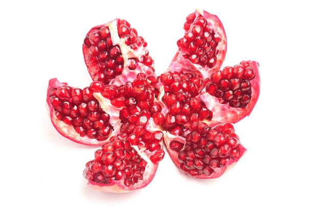 切片的石榴在白色的背景楔形图片下载