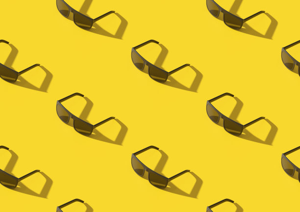 等距无缝模式的太阳镜上的黄色背景。3 d演示。图片下载