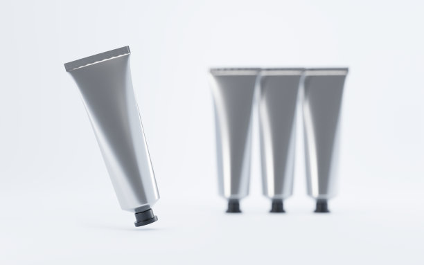 金属管手霜或集油油漆。化妆品铝容器模型，空白银色包装的牙膏，胶水或医疗产品在白色背景的品牌和广告，3d插图图片下载