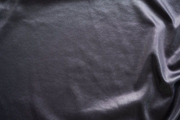 黑色丝绸纹理抽象背景。图片下载