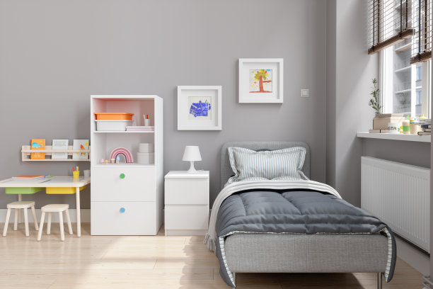 儿童房有床，书桌，橱柜和画框在墙上图片下载