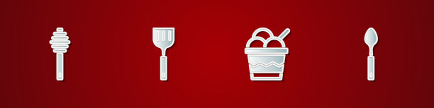 将蜂蜜勺、棒状抹刀、冰淇淋放入碗中图片下载