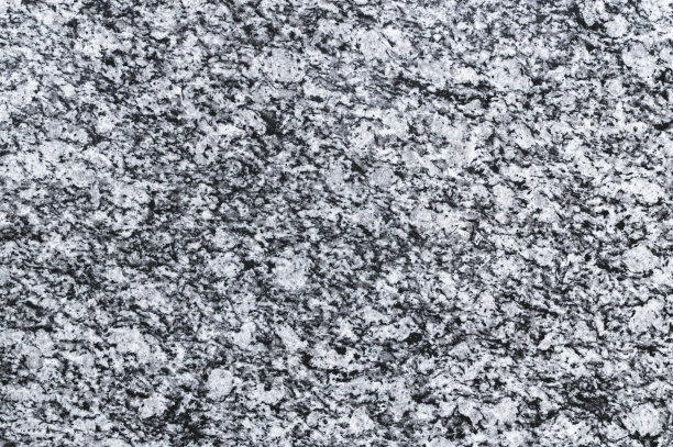 纹理自然的灰色花岗岩石材。建筑材料图片下载