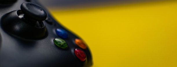 一些图片在黄色和黑色的主题，游戏控制器，和一些东西在黄色的背景。图片下载