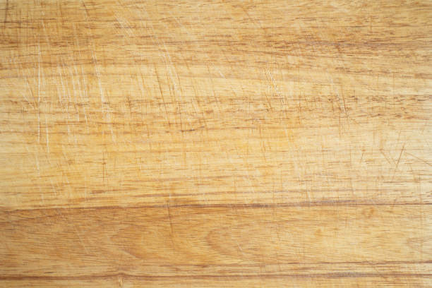 一个使用过的木制厨房砧板背景图片下载