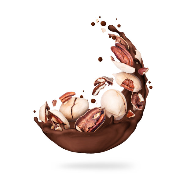 白色背景上的巧克力与山核桃的特写图片下载