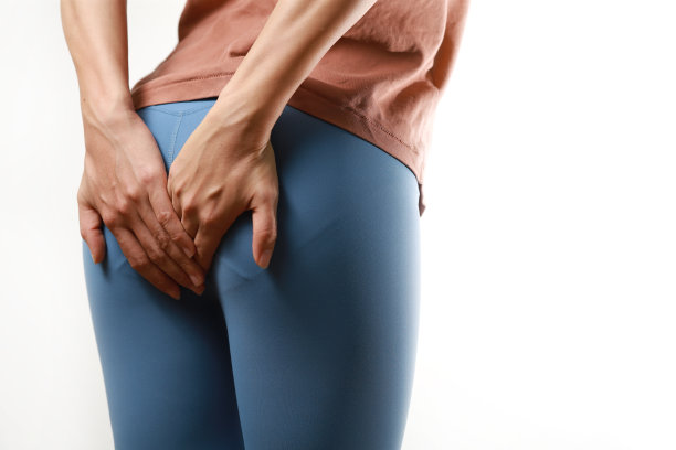 亚洲女人的痔疮和手握她的屁股。图片下载