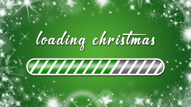 装载圣诞贺卡-白色字母和装载条在绿色背景与白色雪花和冰星星图片下载