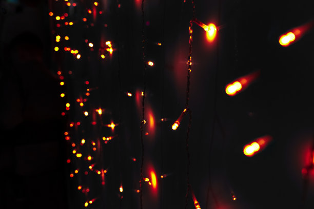 黑色背景上发光元素的抽象背景图片下载