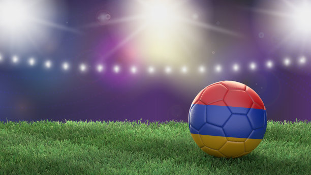 在一个明亮模糊的体育场背景上的国旗颜色的足球。亚美尼亚。图片下载