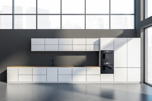 灰色的厨房内部设置了混凝土地板上的全景窗户图片下载