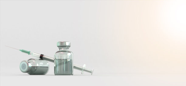 白色背景上的液体药物和注射器。图片下载