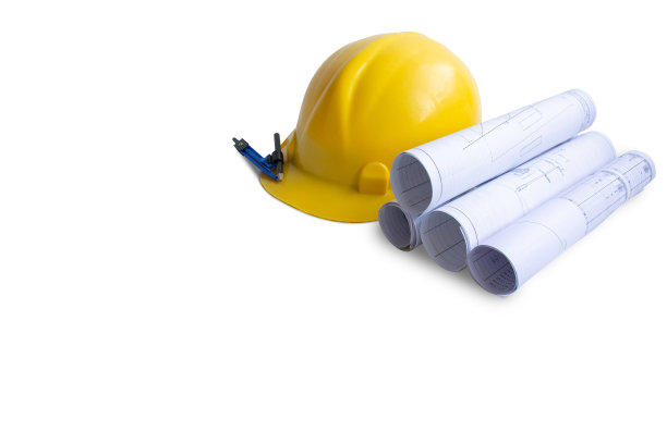 带图纸和铅笔的黄色施工头盔，工程师安全概念，文本复制空间。图片下载