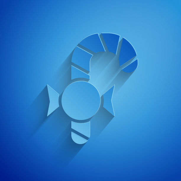 蓝色背景上的圣诞节糖果手杖剪纸风图案图片下载