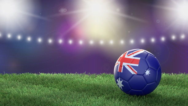 在一个明亮模糊的体育场背景上的国旗颜色的足球。澳大利亚。图片下载