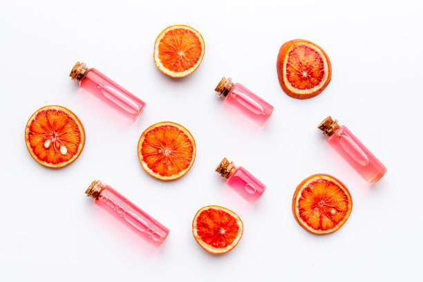 平铺柑橘类化妆品与精油维生素c图片下载