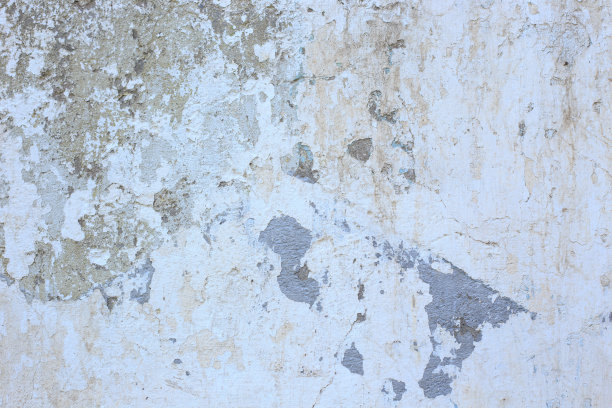 旧墙的质感。抽象的背景。白色的旧漆图片下载
