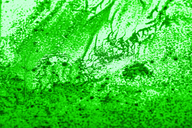 油漆洒在有纹理的塑料表面上。轻叠加模式与干油漆纹理。模糊的图像在一个角度图片下载