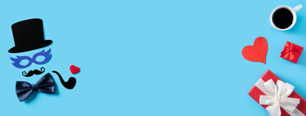 父亲节礼物设计理念。蓝色桌子背景上的纸装饰俯视图。图片下载