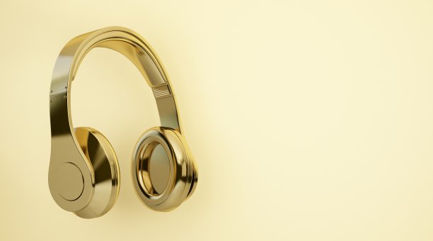 金色耳机，黄色背景图片下载