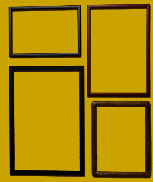 不同颜色背景的空画框，在墙上，在架子上，抽象的，木制的框架。图片下载