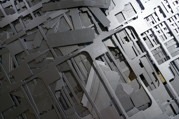 部分废料经过激光数控加工后。废金属。激光切割后的金属残留图片下载