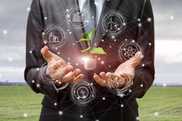 商人显示了一个模糊的背景上的能源生产结构。图片下载