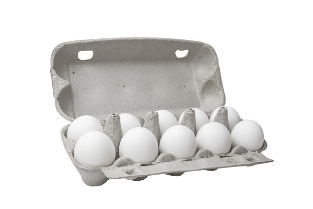 白鸡蛋装在硬纸板里，背景图片下载