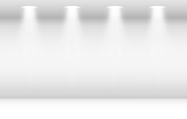 空的白色房间和聚光灯。空的空白房间，墙壁和地板的室内背景图片下载