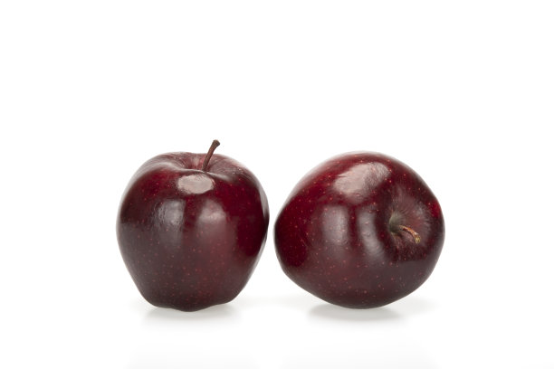 白色背景上的红苹果。图片下载