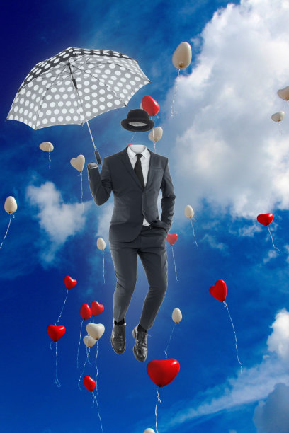 带着圆顶礼帽和伞的跳跃男子图片下载