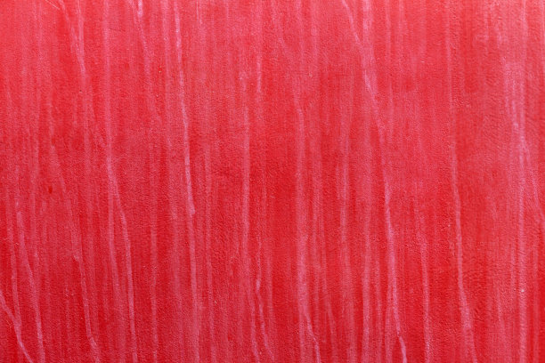 红色的墙壁上有垂直的白色条纹图片下载