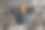 一个在电脑前把手放在头后面休息的家伙图片下载