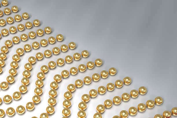 透明的钓鱼线上的金丝珠子的背景。珠子是对角线排列的。3 d演示。图片下载
