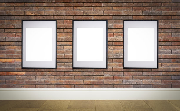模拟海报框架在内墙。白色框架海报或照片形象的砖阁楼墙在家庭房间或办公室内部图片下载