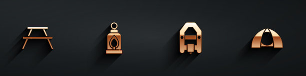 野餐桌上摆上长凳和野营灯图片下载