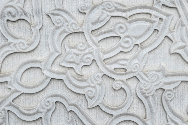 东方风格的雕刻花卉图案的石材大理石墙图片下载