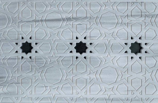 东方风格的雕刻花卉图案的石材大理石墙图片下载