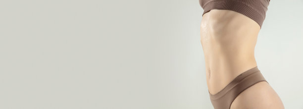 完美苗条的年轻身体的女孩或健康的女人在工作室。健身，饮食，运动，整形图片下载