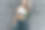 水平图像的一个美丽的运动员年轻女子摆下灰色混凝土墙后锻炼户外。适合女性在户外晨练后休息。图片下载