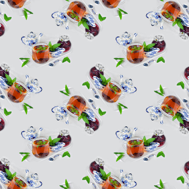 一杯薄荷茶，厨房台面上放着新鲜的金银花浆果和果酱。无缝纺织模式图片下载