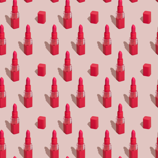 无缝模式的红色口红和帽子在粉红色的背景。一排排的红色唇膏图片下载