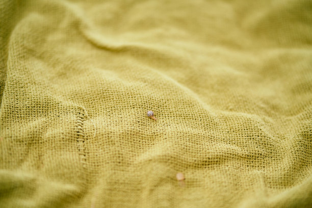 绿色编织粗麻布毯子特写图片下载