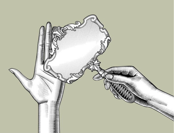 女性的手拿着一面复古的镜子图片下载