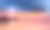 海滩上美丽的夕阳，岸边发光的灯塔。图片下载