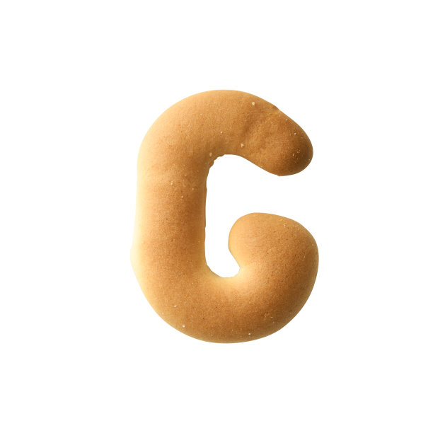 白色背景上的大写字母饼干G的孤立镜头图片下载