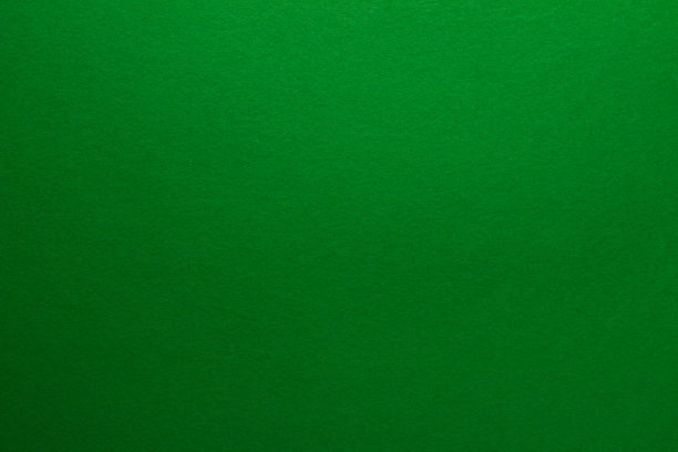 绿色背景。一张空白的绿色有纹理的纸，靠近。图片下载