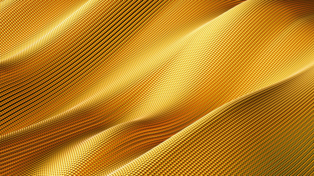 金色抽象背景上的窗帘粒子与金色的亮点。图片下载