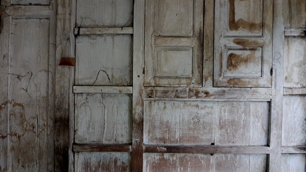 分隔的旧胶合板墙的背景图片下载