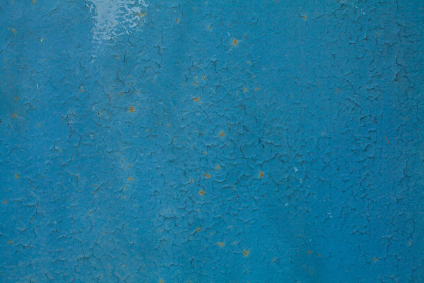 蓝色灰泥墙背景有裂缝图片下载